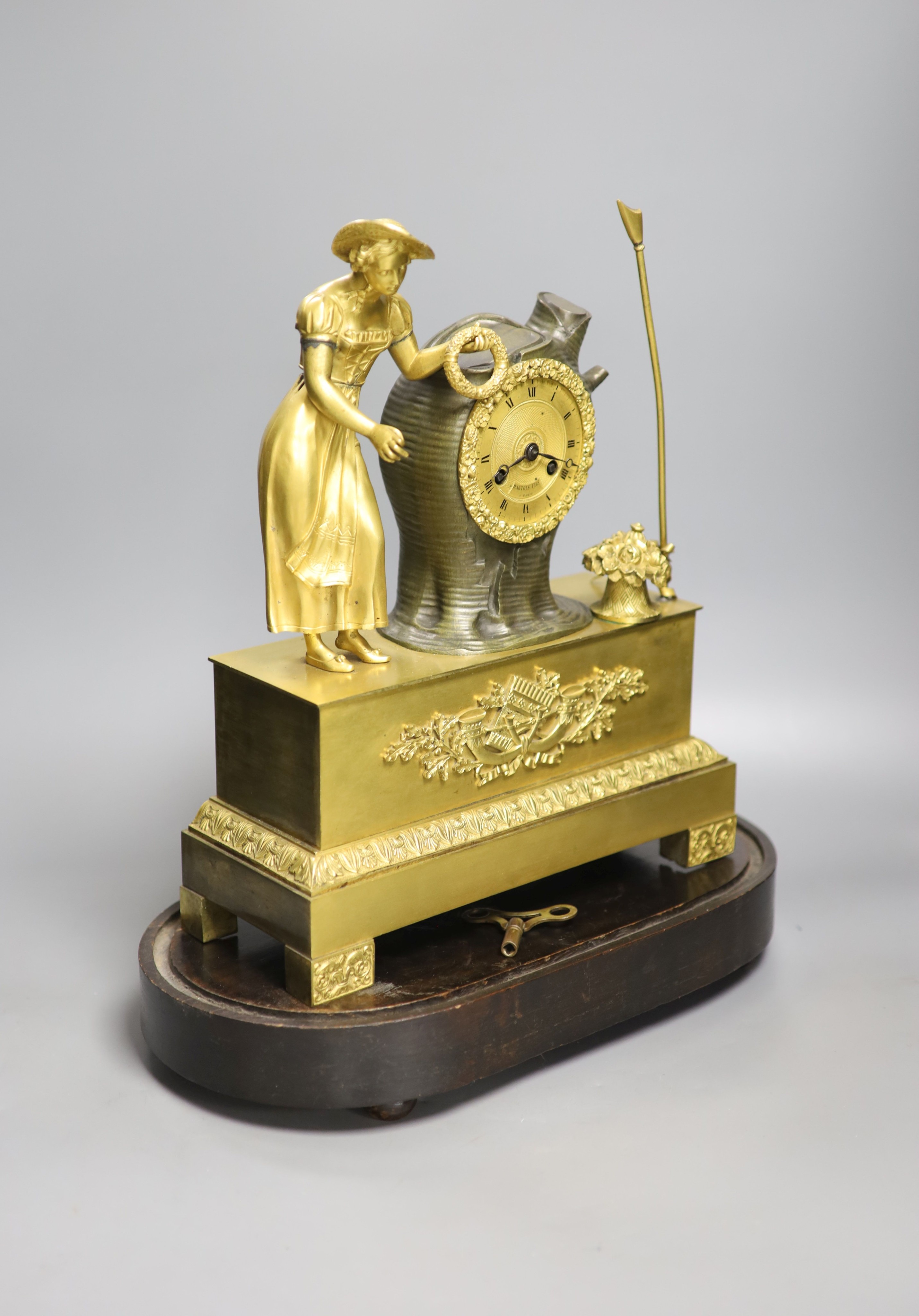 A 19th century ormolu and bronze mantel clock by D Artois, Paris under dome 44cm incl dome